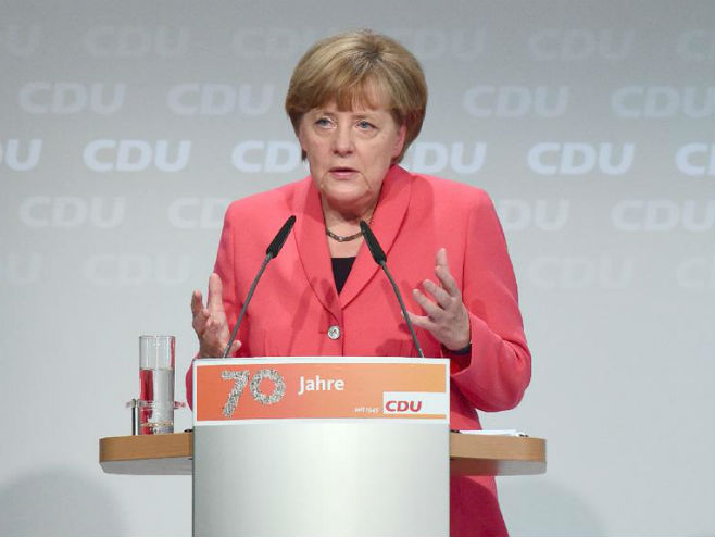 Ангела Меркел (photo: Twitter @IrishTimes) - 