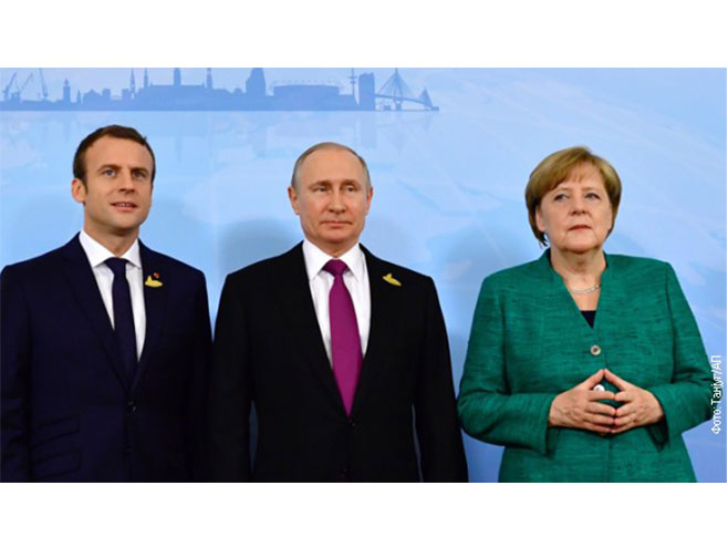 Емануел Макрон, Владимир Путин и Ангела Меркел - Фото: РТС