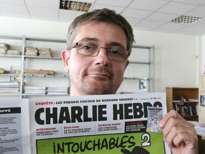 Стефан Шарбоније, карикатуриста "Шарли ебдо" - Фото: AP