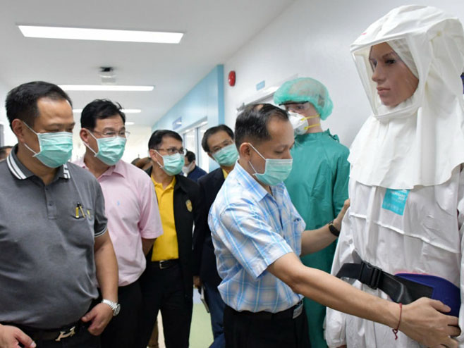 Тајландски доктори излијечили двоје пацијената из Вухана - Фото: AFP