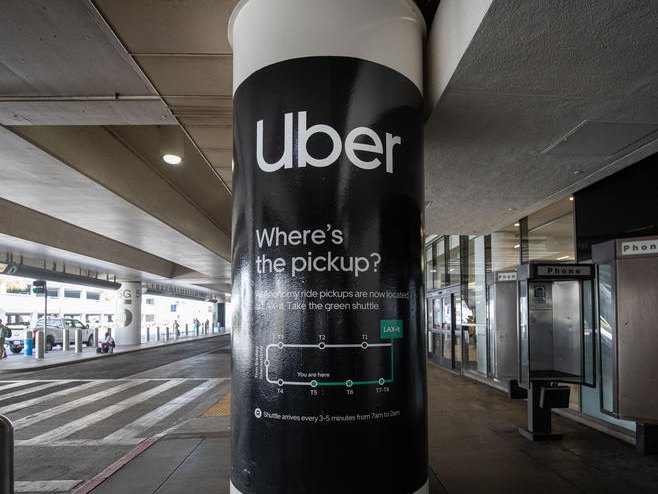 Компанија Убер (Фото: EPA/CHRISTIAN MONTERROSA) - 