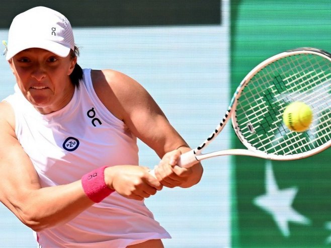 Ига Својнтек (Фото: EPA-EFE/CAROLINE BLUMBERG) Ига Својнтек (Фото: EPA-EFE/CAROLINE BLUMBERG) -