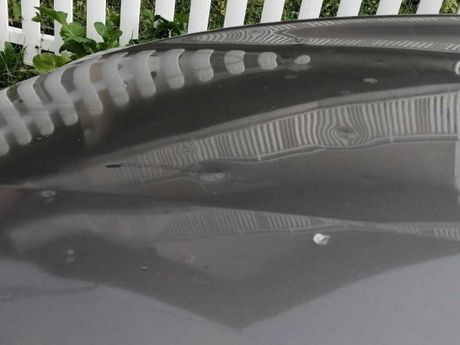 Oštećeni automobili (Foto: RTRS)
