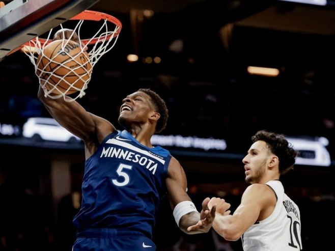 Играч Минесоте (Фото: EPA/ERIK S. LESSER SHUTTERSTOCK OUT) - 