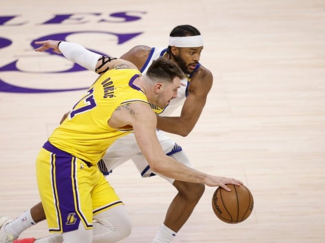 Лука Дончић (фото: EPA-EFE/CAROLINE BREHMAN) - 