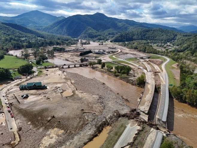 Поплаве у САД-у (Фото: EPA-EFE/BILLY BOWLING, илустрација) - 