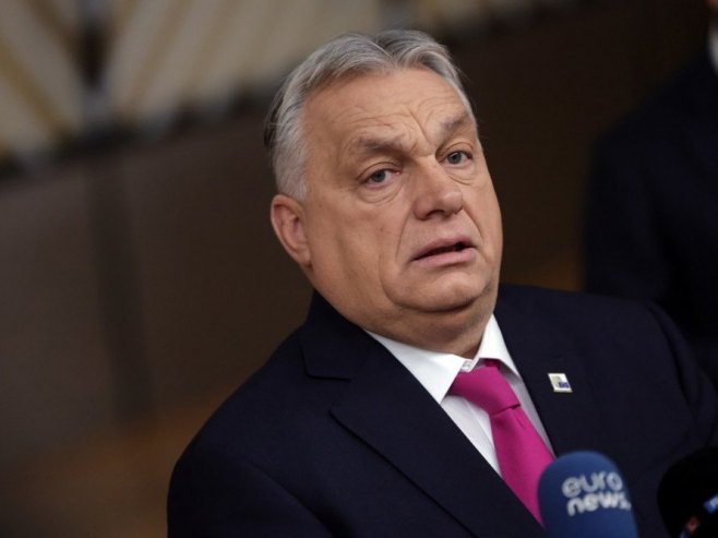 Виктор Орбан (фото: EPA/OLIVIER MATTHYS) - 