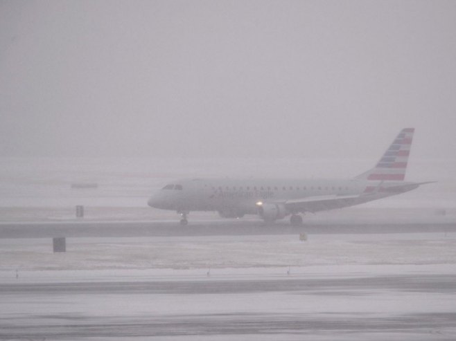Авион олуја (фото: EPA/ERIK S. LESSER) - 