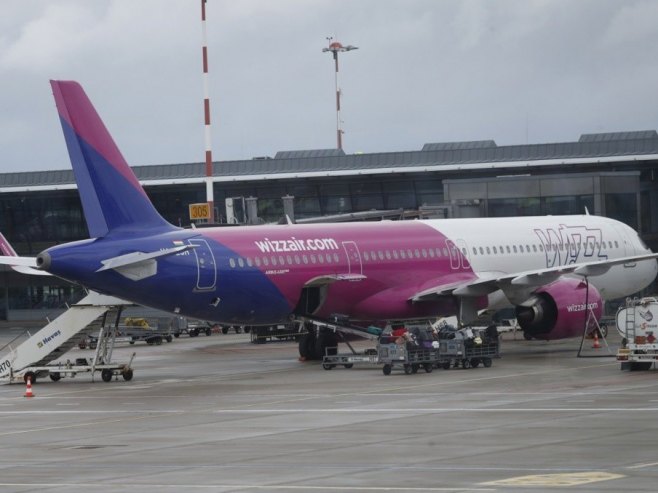 Авион (фото: EPA/TOMS KALNINS) - 